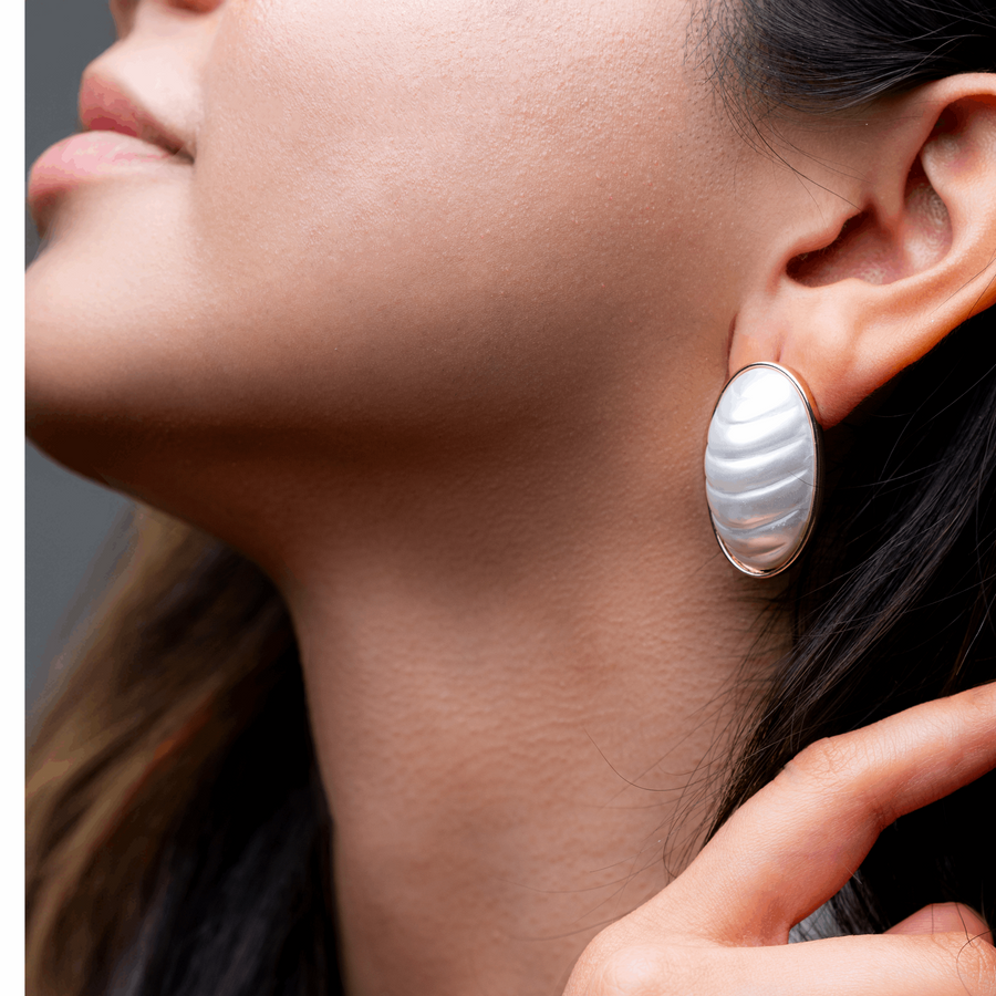 MOTHER-OF-PEARL STUDS