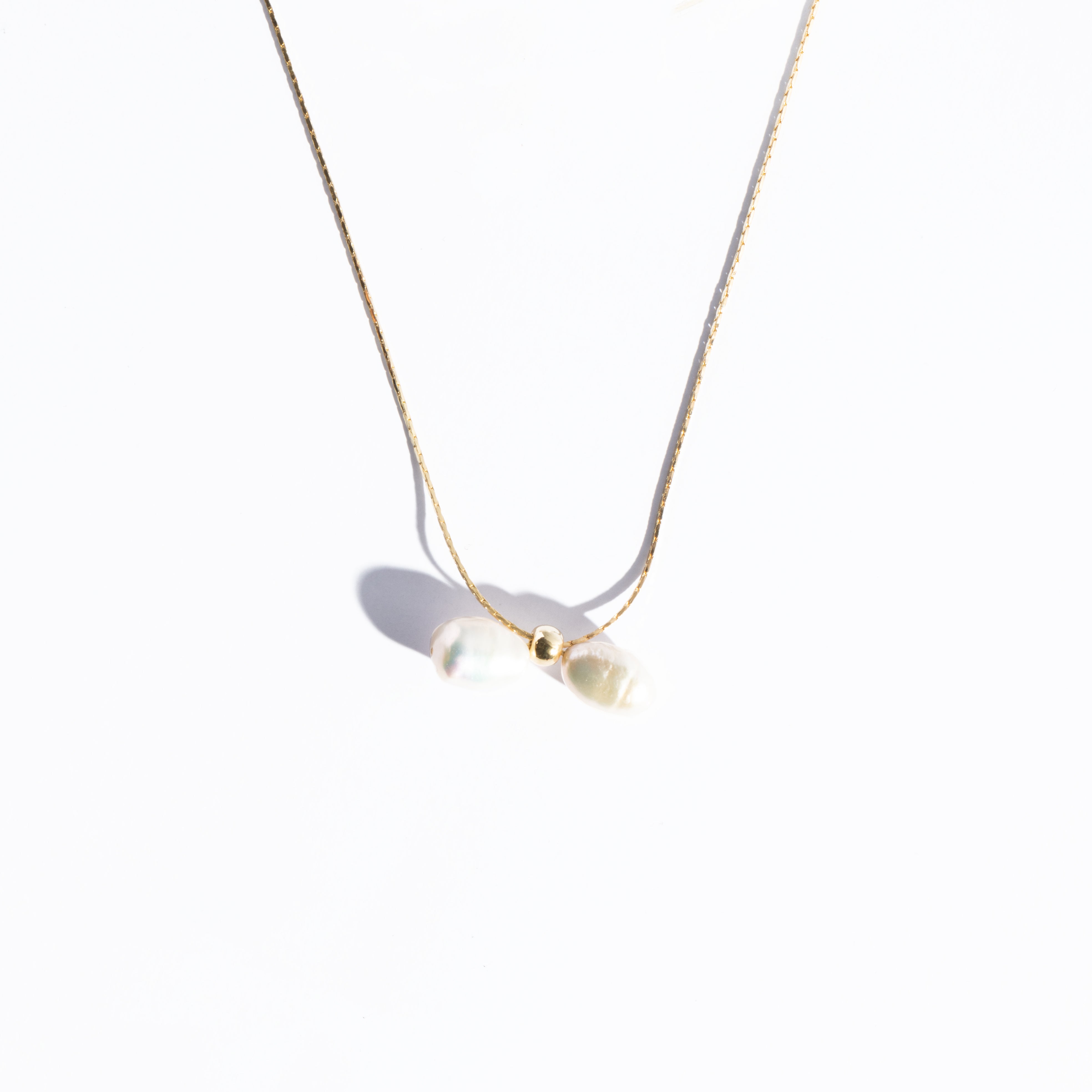 PEARL-BOW PENDANT