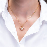 STUDDED EVIL-EYE SPINNING PENDANT